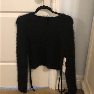 fuzzy black sweater